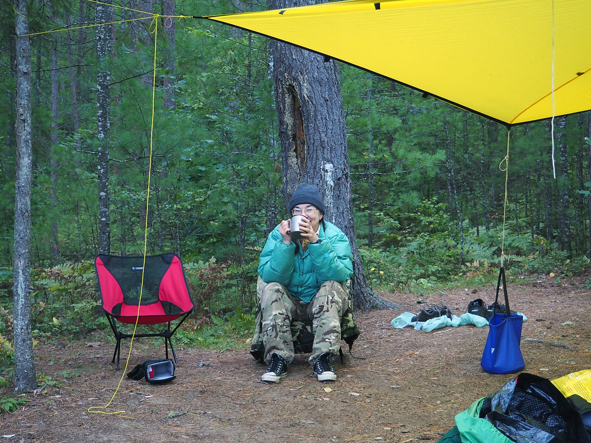Drinking coffee at campsite on Five Mile Rapids on the Petawawa River in Algonquin Park