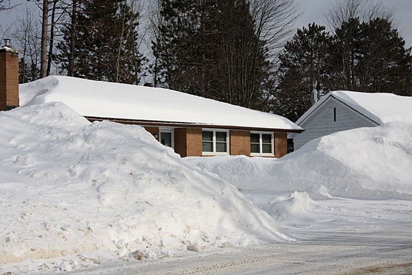 Snow banks along Summit Street in Deep River