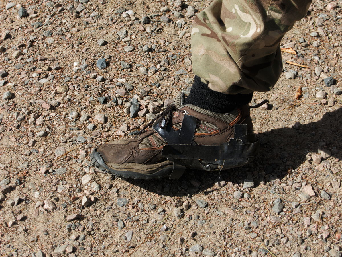 shoes held together with Gorilla Tape