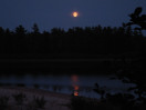Harvest moon over Lake Travers in Algonquin Park