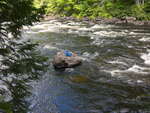 Stranded frame pack at Rollway Rapids on the Petawawa River in Algonquin Park