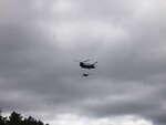 Chinook Helicopter with artillery piece above McManus Lake on the Petawawa River in Algonquin Park