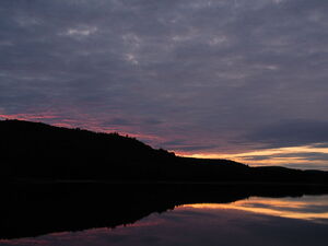 Sunrise on Whitson Lake in Algonquin Park  It looks like rain is on the way