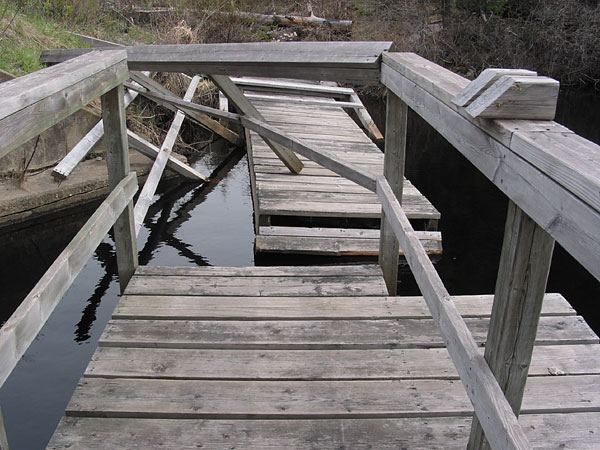 damaged boardwalk along Chalk River