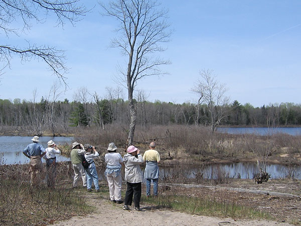A group of bird watchers on the Four Seasons Land in Deep River