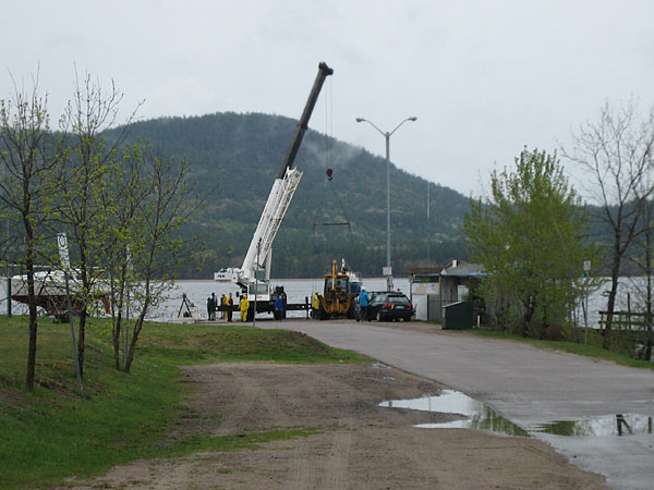 Launching sailboats at the Deep River Pier