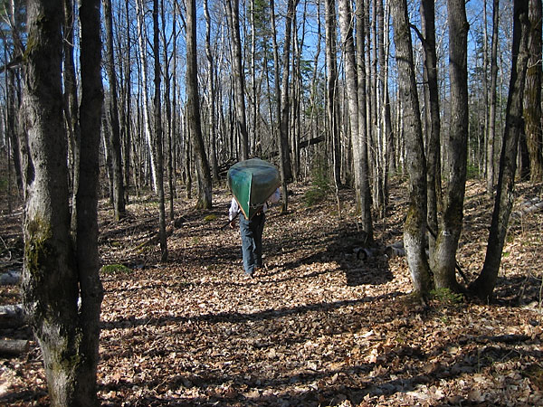 portaging down to Tecumseh Lake in the Brent Crater in Algonquin Park