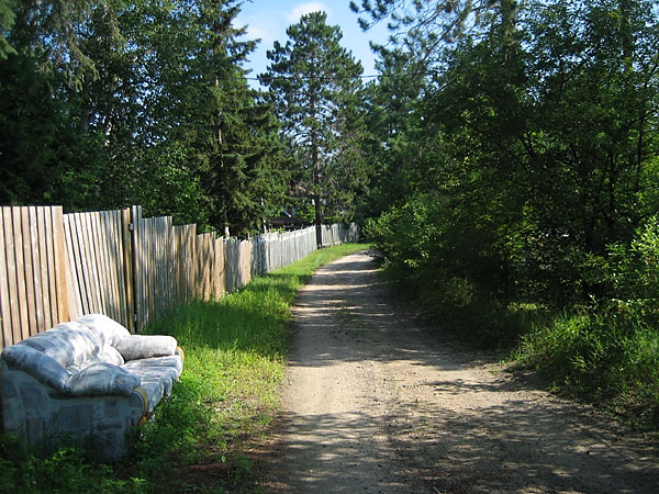 Couch along back lane in Deep River