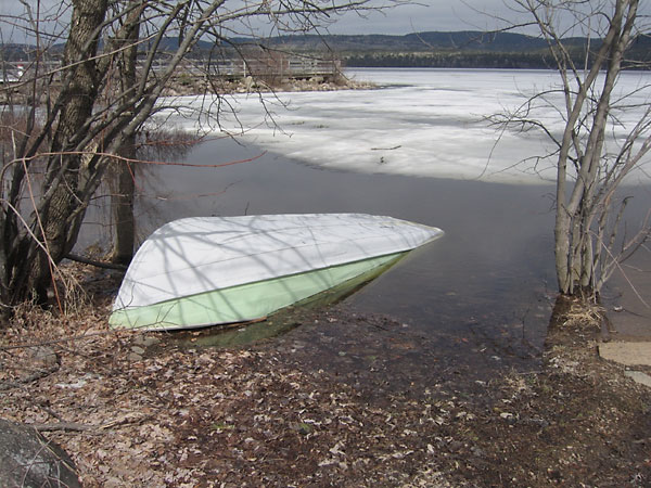 overturned boat on shore of Ottawa River along Deep River Waterfront